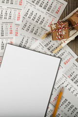 Blank sheet of paper on a new year's background.