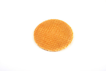 Round ruddy waffle isolated on white background.
