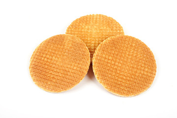 Round ruddy waffle isolated on white background.