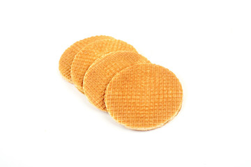 Round ruddy waffle isolated on white background.