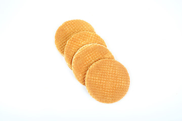 Round ruddy waffle isolated on white background.