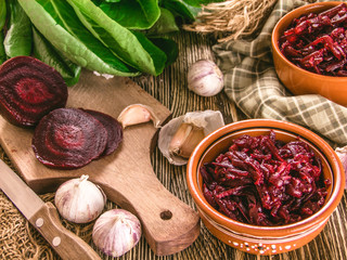 Boiled beets on wooden background
