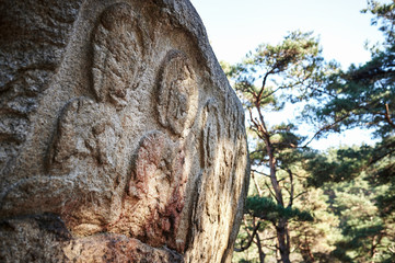 Buddhist Figures Carved On Rock Surface in Gyeongju.