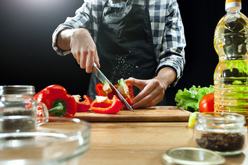 Preparing salad. Female chef cutting fresh vegetables. Cooking process. Selective focus. The healthy food, kitchen, salad, diet, cuisine, organic concept