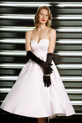 Fototapeta premium Beautiful girl dressed at pin-up style