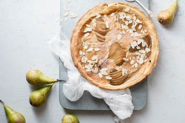 Tart with poached pears and almond frangipane