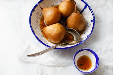 Tea poached pears with anise, cinnamon and other spices