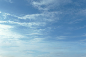 Light blue sky with light clouds