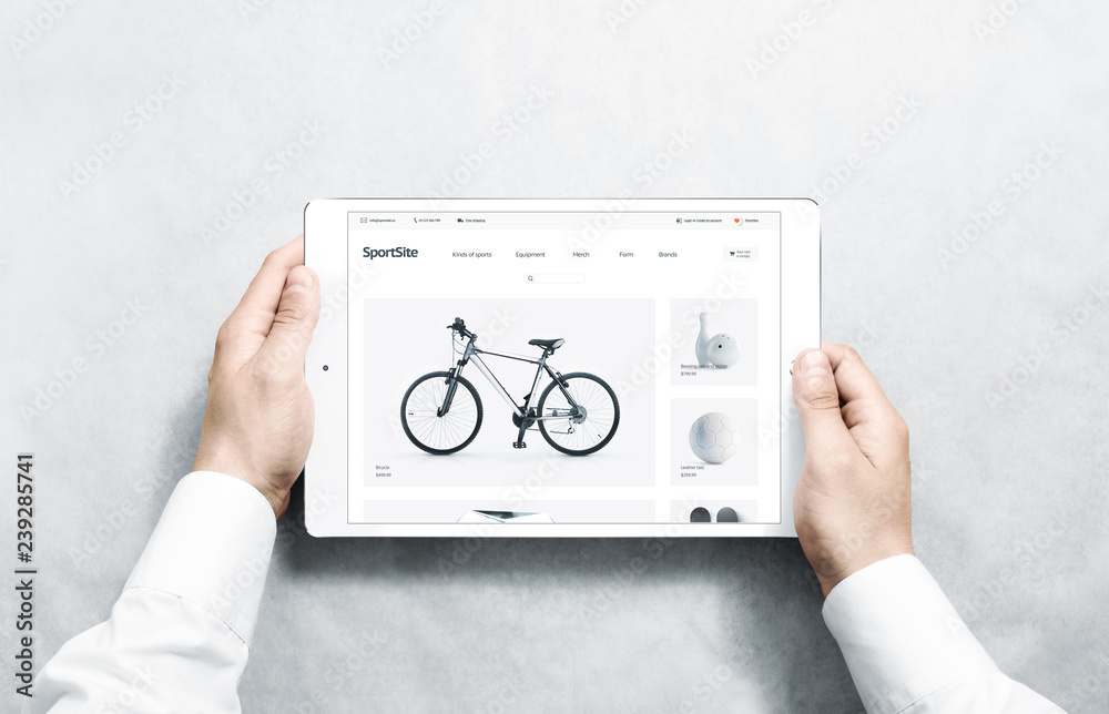 Canvas Prints hands holding tablet with sport webstore mock up on screen