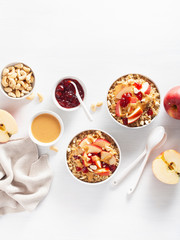 apple peanut butter quinoa bowl with jam and cashew for healthy breakfast