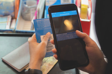 Registration employees are putting nano SIM cards in the store for customers to buy.