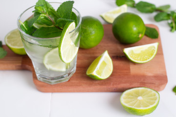 mojito, drink, lime and mint with ice on a white background.