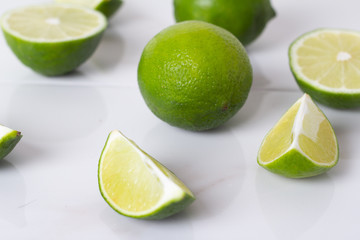 lime slices on a white background, close-up.
