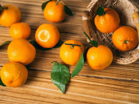 Tangerines on a wooden table