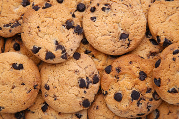 Chocolate cookies background. Chocolate chip cookies shot