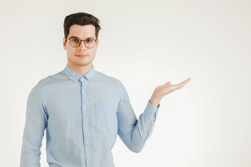 Cute man in action of hand presenting.