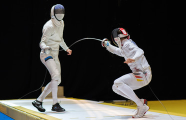 Naklejka premium Two man fencing athletes fight