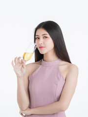 Confident woman posing with champagne glass.