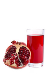 Ripe pomegranate fruit and glass of juice isolated on white background
