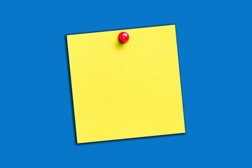 Yellow memo card with red pin. Square note paper. Empty copy space for text message. To do list...