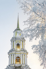 The bell tower of the cathedral (spire) against the sky in winter