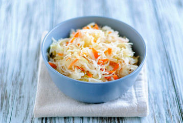 Bowl with sauerkraut standing on table