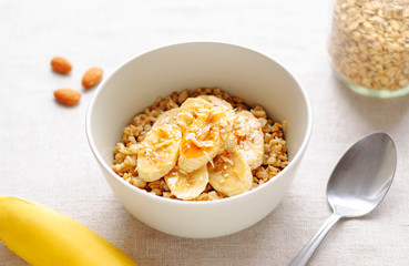 Bowl of oatmeal with banana slieces