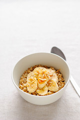 Bowl of oatmeal with sweet banana