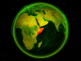 Somalia from space on planet Earth with digital network representing international communication, technology and travel.