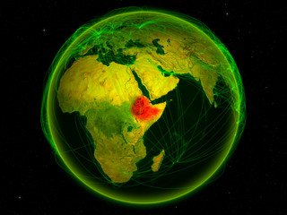 Ethiopia from space on planet Earth with digital network representing international communication, technology and travel.