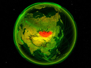 Mongolia from space on planet Earth with digital network representing international communication, technology and travel.