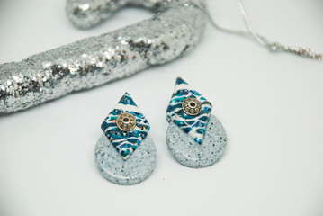 Geometric winter blue and grey earrings with christmas decor. Handmade jewelry of polymer clay.