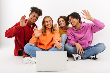 Group of cheerful teenagers isolated