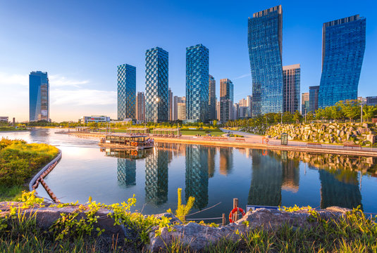 Seoul city with Beautiful sunset, Central park in Songdo International Business District, Incheon South Korea.