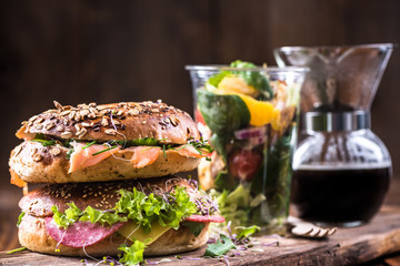 Superfood breakfast idea,bagels,salad and coffee