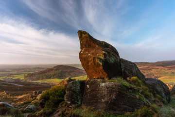 Fototapeta na wymiar A beautiful Ramshaw Rocks sunrise at Ramshaw Rocks, Staffordshire in the Peak District National Park.