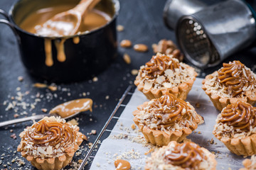 Baking salted caramel toffee cupcakes,sweet pastry food