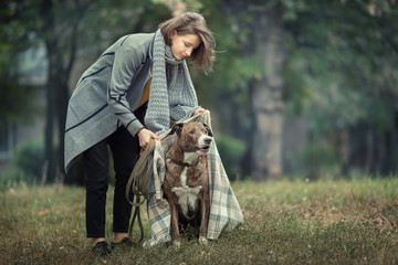 Girl walking with a dog