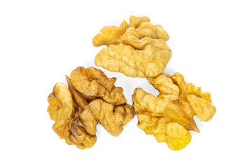 Top view of dry and shelled walnuts isolated on a white background