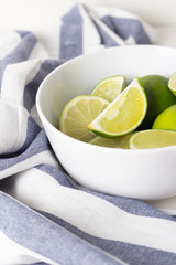 lime in white plate close up.