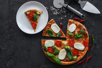 pizza, broccoli, tomato sauce, cheese and more. food background