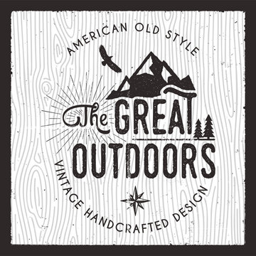 The Great Outdoors card. Wanderlust Camping badge. Old hand drawn t shirt Print Apparel Graphics. Retro Typographic Custom Quote Design. Textured Stamp effect. Vintage camp style. Stock Vector emblem