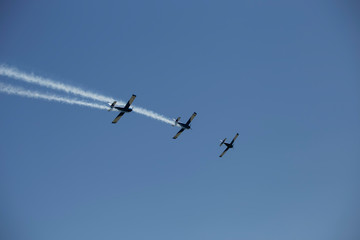 Fototapeta na wymiar Aerobatics in an air show