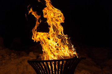 Aggressive fire – burning flames on black background