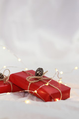 Christmas presents in front of a white background
