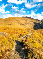 Lonely path to the Fairy Pools in front of the Black Cuillin Mountains on the Isle of Skye - Scotland