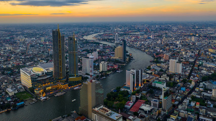 Fototapeta na wymiar Bangkok City at evening and Chaopraya River, aerial view, Bangkok, Thailand.