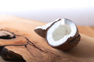 Whole single organic Tropical coconut  fruit on wodden background with copy space