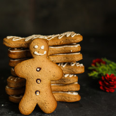 gingerbread man - handmade baking (dessert cookies). happy new year. food background