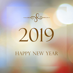 Happy New Year 2019 on blur abstract bokeh background, new year greeting card, banner